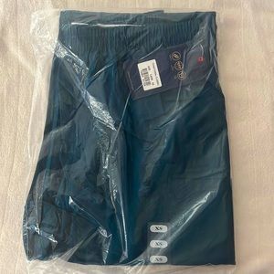 New with tags. XS traditional class scrub pants. Color Craw